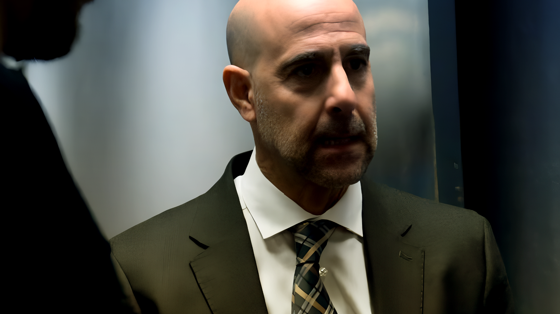 NOMIS - con Stanley Tucci"